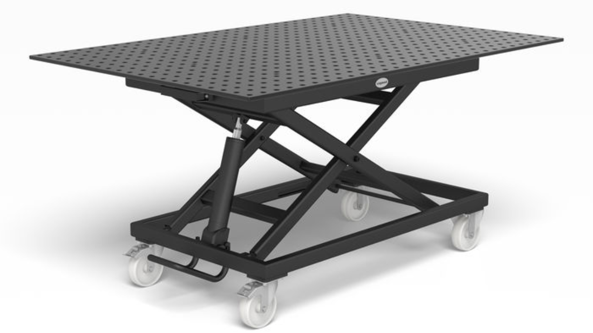 Dettaglio di tavolo con sistema idraulico industriale di precisione e meccanica di sollevamento